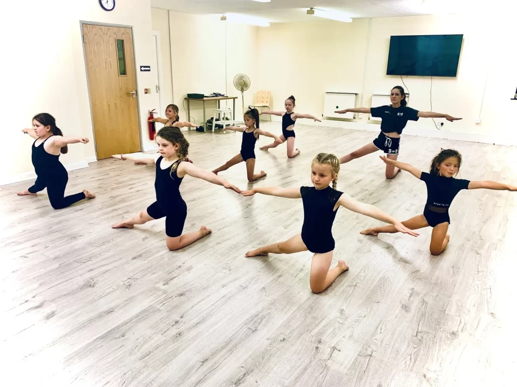 A class rehearsing together in the Slater Stars studio